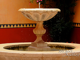 Hand carved octagonal limestone pool fountain